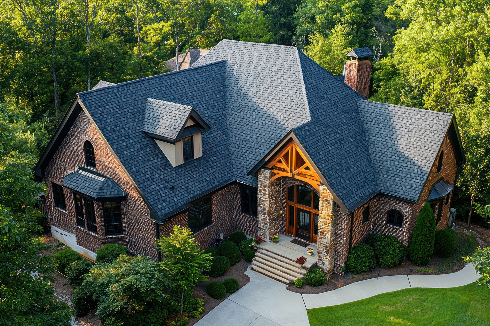 Luxury home with premium roofing at golden hour